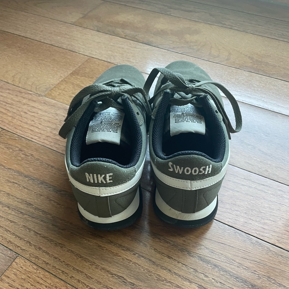 Size 6 Nike Swoosh sneakers. They have only been worn a handful of times.